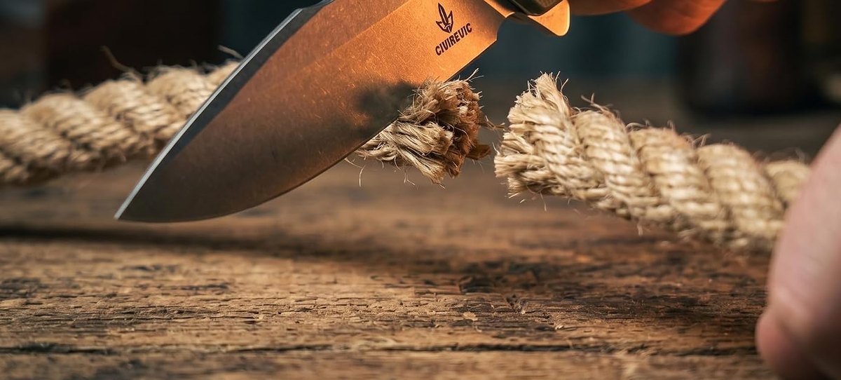 Blade cutting rope on a workbench